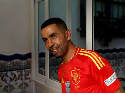 FILE PHOTO: Mounir Nasraoui, father of soccer player Lamine Yamal, smiles in Bar El Cordobes at Rocafonda neighbourhood in Mataro, north of Barcelona, Spain, July 11, 2024. REUTERS/ Albert Gea/File Photo