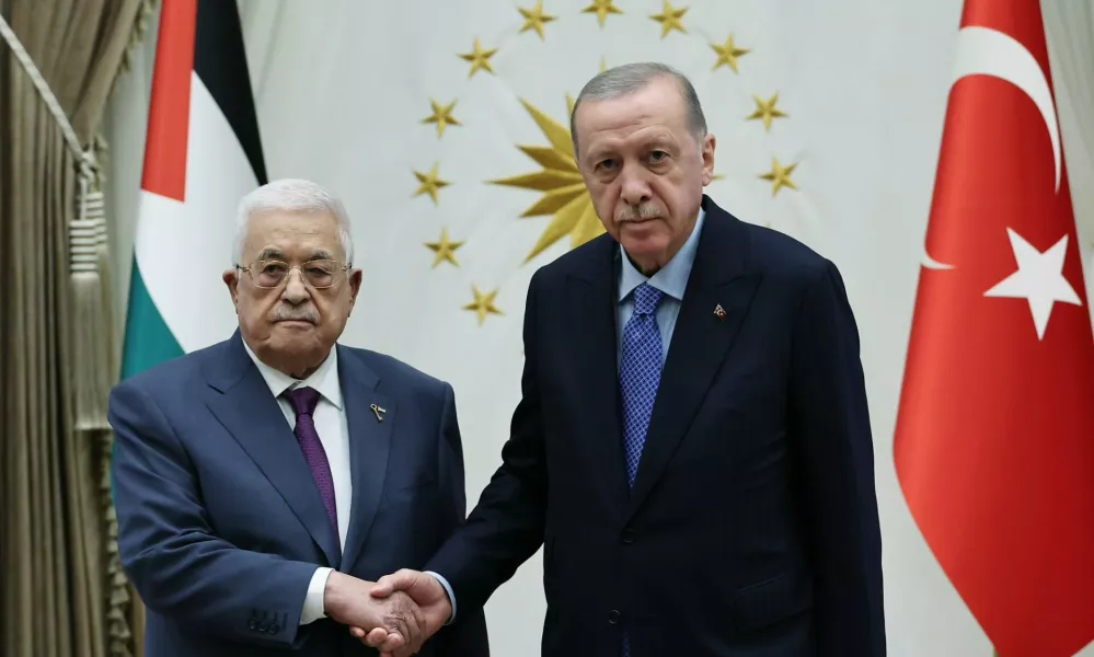 HANDOUT - 14 August 2024, Turkey, Ankara: Turkish President Recep Tayyip Erdogan (R) welcomes Palestinian President Mahmoud Abbas ahead of their meeting at the Presidential Complex. Photo: -/Turkish Presidency/dpa - ATTENTION: editorial use only and only if the credit mentioned above is referenced in full