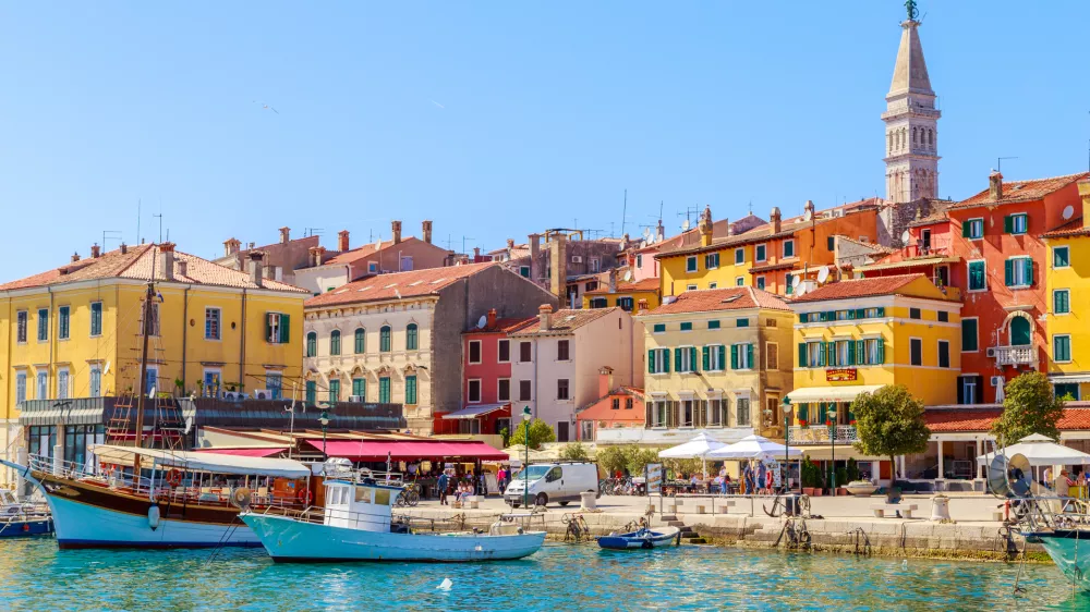 Colorful Rovinj in Istria with boats in the port, Croatia