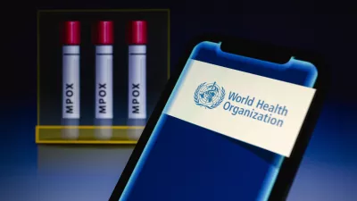 14 August 2024, Paraguay, Asunción: World Health Organization (WHO) logo is displayed on a smartphone in front of visual representation of test tubes labeled 'mpox'. WHO on 14 August 'has determined that the upsurge of mpox in the Democratic Republic of the Congo (DRC) and a growing number of countries in Africa constitutes a public health emergency of international concern (PHEIC) under the International Health Regulations (2005) (IHR).' Photo: Andre M. Chang/ZUMA Press Wire/dpa