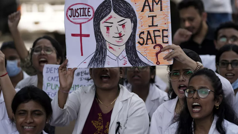 Resident doctors and medical students stage a protest against the alleged rape and killing of a doctor, at Kolkata's RG Kar Medical College and Hospital in Mumbai, India, Saturday, Aug. 17, 2024. (AP Photo/Rajanish Kakade)