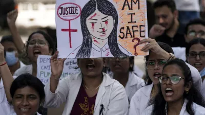 Resident doctors and medical students stage a protest against the alleged rape and killing of a doctor, at Kolkata's RG Kar Medical College and Hospital in Mumbai, India, Saturday, Aug. 17, 2024. (AP Photo/Rajanish Kakade)