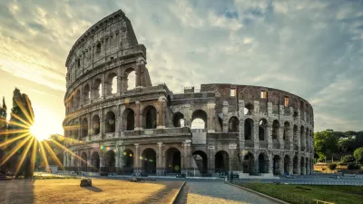 ﻿View of Colloseum at sunrise, Italy.