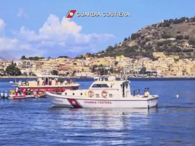 This picture taken from a video released by the Italian Coast Guard on Monday, Aug. 19, 2024, shows the rescue operations in the stretch of Sea near Palermo, Sicily, in southern Italy, where the sailing yacht Bayesian under the UK flag sank early Monday. (Italian Coast Guard via AP, HO)