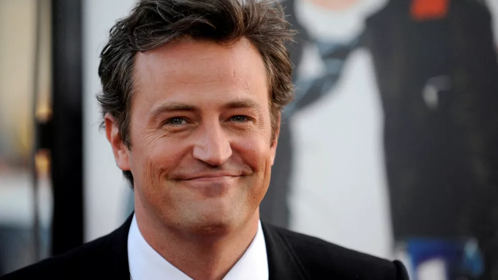 FILE PHOTO: Cast member Matthew Perry attends the premiere of the film "17 Again" in Los Angeles April 14, 2009. REUTERS/Phil McCarten/File Photo