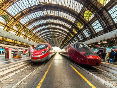 R9214C MILANO, ITALY - DECEMBER 12, 2018: TRENITALIA FRECCIAROSSA and NTV ITALO trains waiting at Milano Centrale station