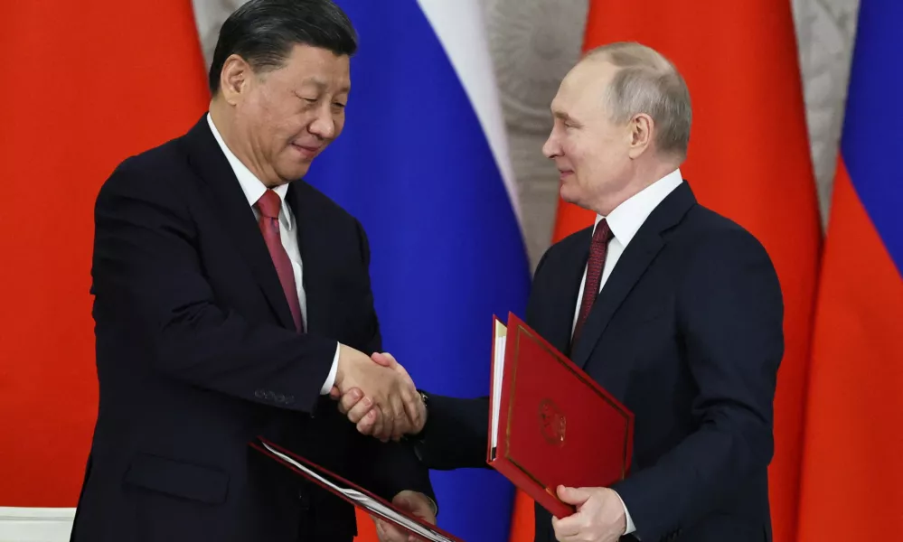 Russian President Vladimir Putin shakes hands with Chinese President Xi Jinping during a signing ceremony following their talks at the Kremlin in Moscow, Russia March 21, 2023. Sputnik/Mikhail Tereshchenko/Pool via REUTERS ATTENTION EDITORS - THIS IMAGE WAS PROVIDED BY A THIRD PARTY.