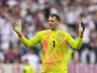 FILE - Germany's goalkeeper Manuel Neuer reacts during a quarter final match between Germany and Spain at the Euro 2024 soccer tournament in Stuttgart, Germany, Friday, July 5, 2024. (AP Photo/Matthias Schrader, File)