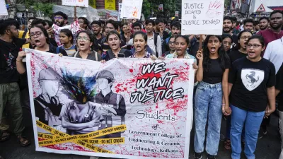 Engineers and engineering students attend a protest against the rape and killing of a trainee doctor at a government hospital, in Kolkata, India, Wednesday, Aug. 21, 2024. India's top court on Tuesday set up a national task force of doctors who will make recommendations on safety of health care workers at their workplace, days after the rape and killing of a trainee doctor that sparked outrage and nationwide protests. (AP Photo/Bikas Das)