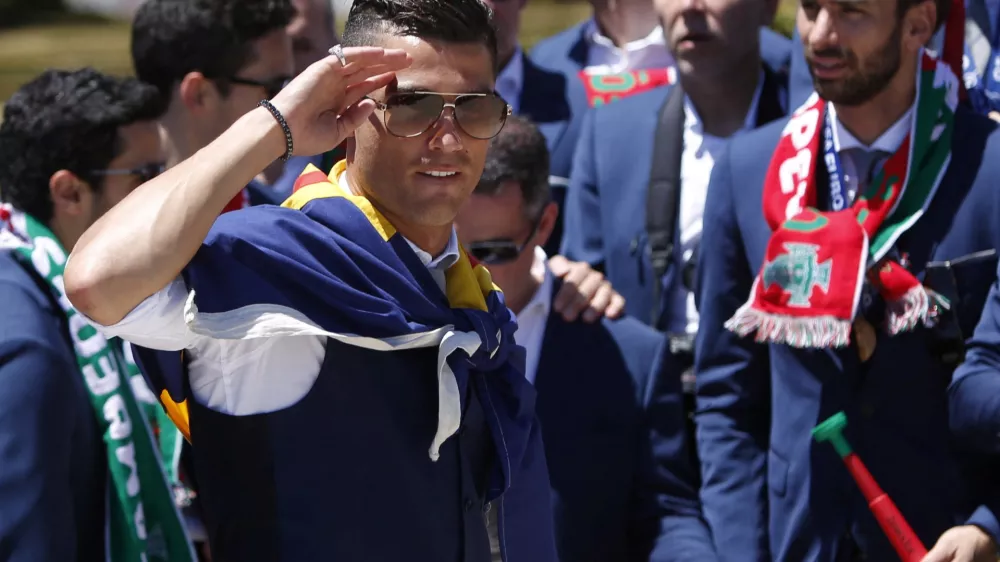 FILE PHOTO: Cristiano Ronaldo and Portugal's winning EURO 2016 team arrive for a reception by the Portuguese president after their return to Lisbon, Portugal, July 11, 2016.  REUTERS/Pedro Nunes/File Photo