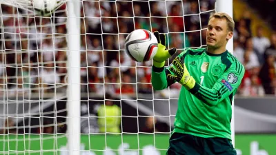 FILE PHOTO: Germany's goalkeeper Manuel Neuer reacts during their Euro 2016 qualification match against Poland in Frankfurt, Germany, September 4, 2015.   REUTERS/Ina Fassbender/File Photo