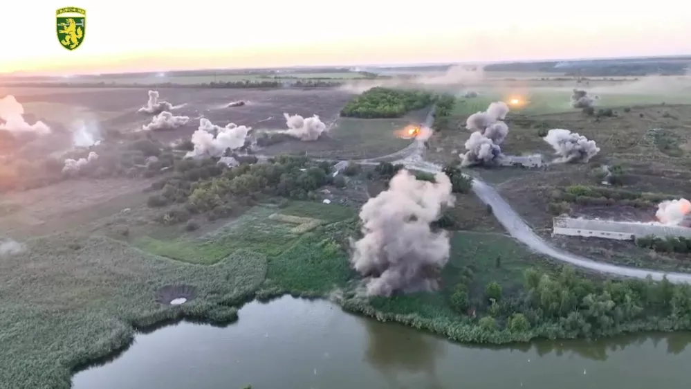 A drone view shows what the 68th Separate Jaeger Brigade 'Oleksy Dovbusha' says are multiple launch rocket system strikes on Russian troops, in Novozhelanne, Donetsk Region, Ukraine, in this still image from handout video obtained on August 21, 2024.  Reuters TV/68TH SEPARATE JAEGER BRIGADE 'OLEKSY DOVBUSHA'/Handout via REUTERS  THIS IMAGE HAS BEEN SUPPLIED BY A THIRD PARTY. MANDATORY CREDIT. NO RESALES. NO ARCHIVES. MUST NOT OBSCURE LOGO