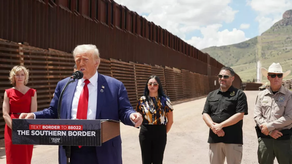 Republican presidential nominee and former U.S. President Donald Trump speaks during a visit at the frontier with Mexico in Hereford, Cochise County, Arizona, U.S. August 22, 2024. REUTERS/Go Nakamura