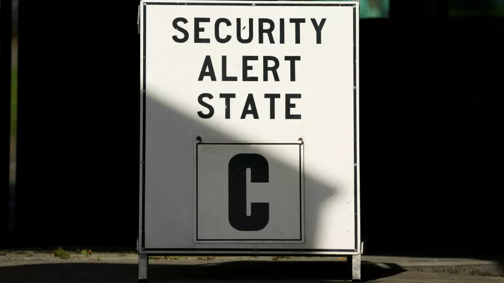 A sign is displayed at the main gate after NATO air base in the German town of Geilenkirchen has raised its security level "based on intelligence information indicating a potential threat," in Geilenkirchen, Germany August 23, 2024. REUTERS/Thilo Schmuelgen