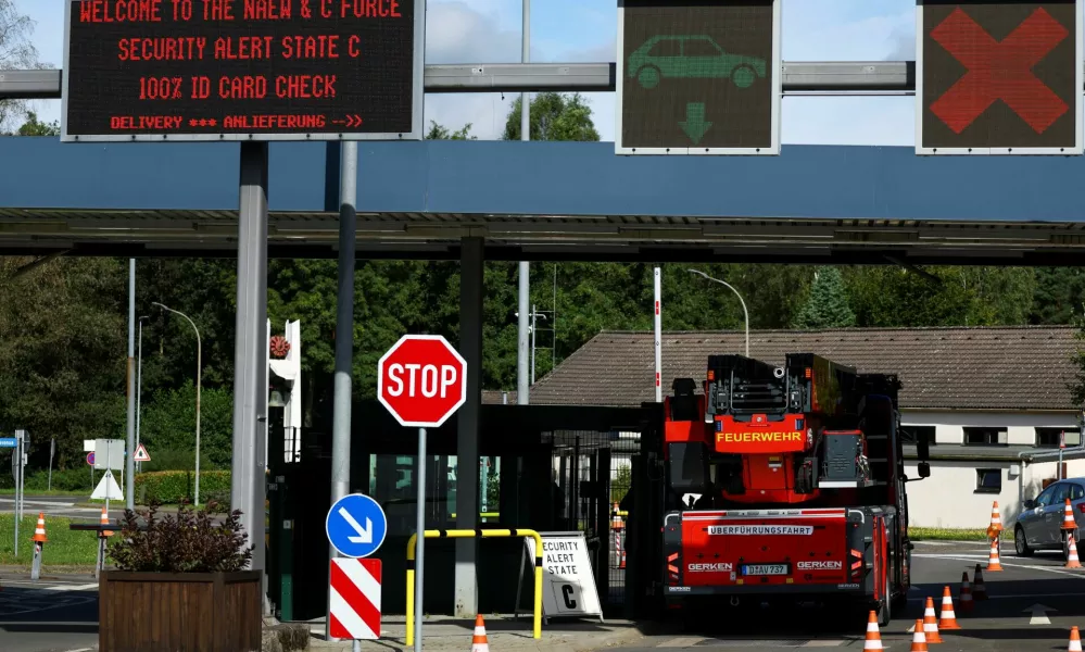 A fire truck stands at the main gate after NATO air base in the German town of Geilenkirchen has raised its security level "based on intelligence information indicating a potential threat," in Geilenkirchen, Germany August 23, 2024. REUTERS/Thilo Schmuelgen