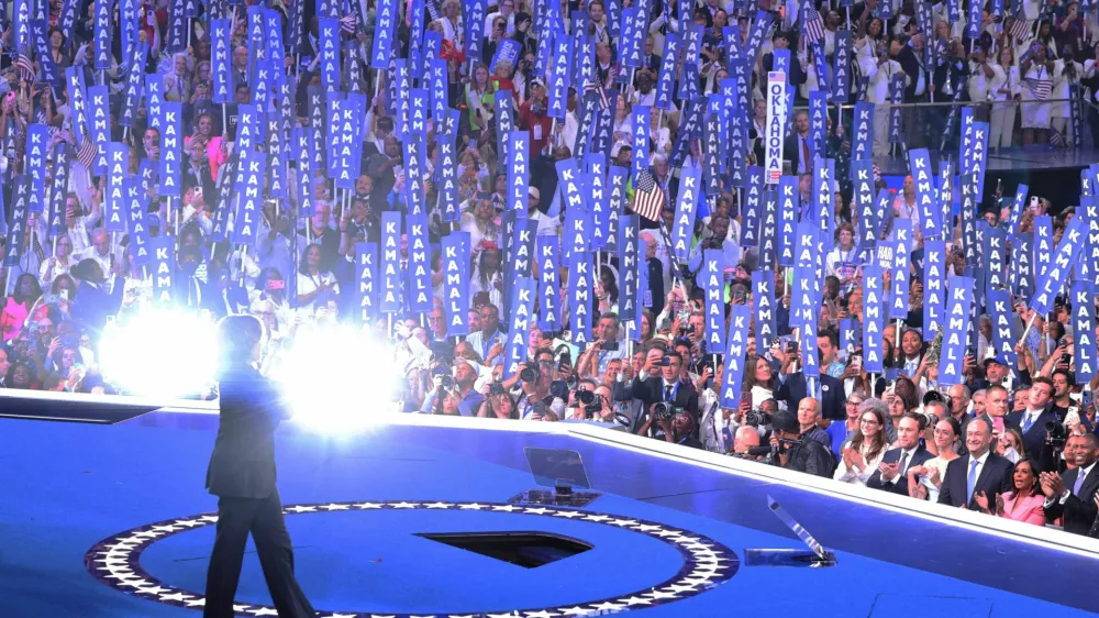 Democratic presidential nominee and U.S. Vice President Kamala Harris takes the stage on Day 4 of the Democratic National Convention (DNC) at the United Center in Chicago, Illinois, U.S., August 22, 2024. REUTERS/Mike Blake