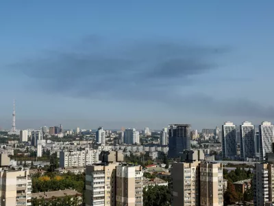 Smoke rises in the sky over the city after a Russian missile strike, amid Russia's attack on Ukraine, in Kyiv, Ukraine August 26, 2024. REUTERS/Gleb Garanich