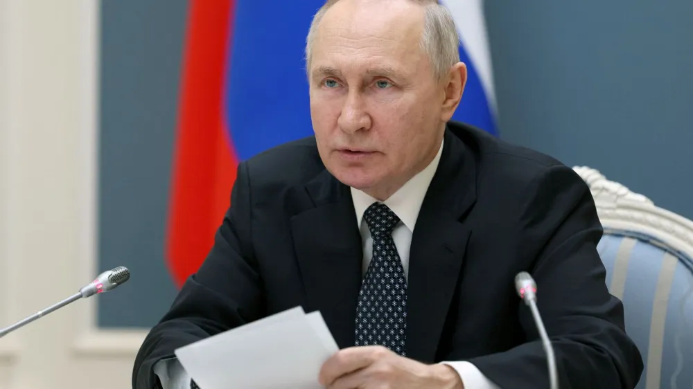 Russian President Vladimir Putin chairs a meeting with members of the Security Council via a video link in Moscow, Russia, April 5, 2023. Sputnik/Gavriil Grigorov/Kremlin via REUTERS ATTENTION EDITORS - THIS IMAGE WAS PROVIDED BY A THIRD PARTY.