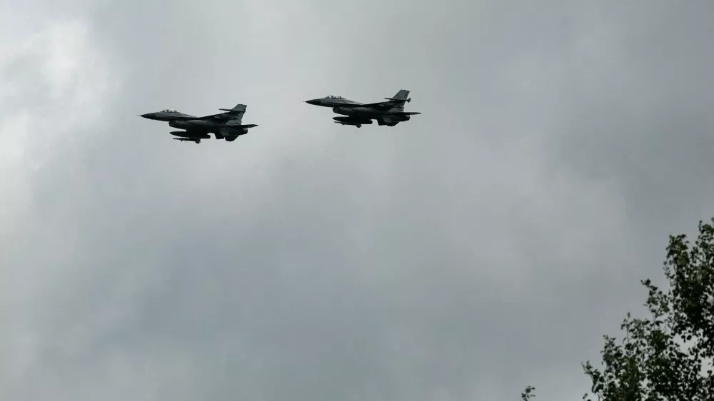 FILE PHOTO: Ukrainian F-16 fighting aircrafts are seen in the air during marking the Day of the Ukrainian Air Forces, amid Russia's attack on Ukraine, in an undisclosed location, Ukraine August 4, 2024. REUTERS/Valentyn Ogirenko/File Photo