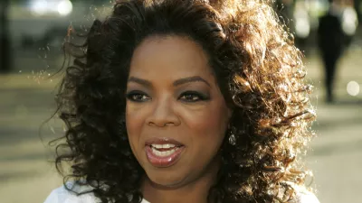 FILE - In this June 25, 2008 file photo, U.S. television presenter Oprah Winfrey arrives for the dinner birthday party of former president of South Africa Nelson Mandela in central London's Hyde Park. Winfrey has settled a defamation lawsuit filed by the ex-headmistress of her girls school in South Africa, lawyers said Tuesday March 23, 2010. The lawsuit by former headmistress Nomvuyo Mzamane claimed Winfrey defamed her in remarks made in the wake of a 2007 sex-abuse scandal at the school. (AP Photo/Lefteris Pitarakis, File)