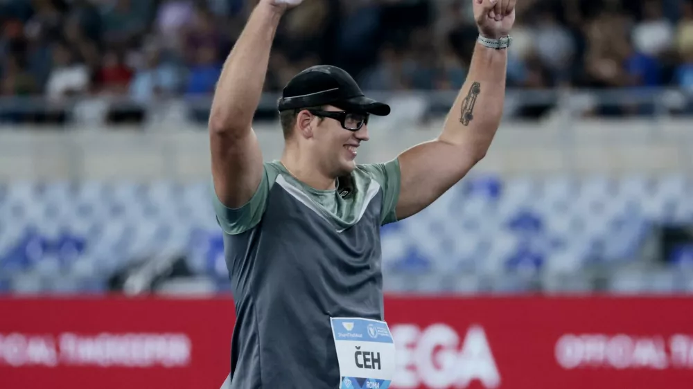 Athletics - Diamond League - Rome - Stadio Olimpico, Rome, Italy - August 30, 2024 Slovenia's Kristjan Ceh celebrates after winning the Men's Discus Throw REUTERS/Remo Casilli