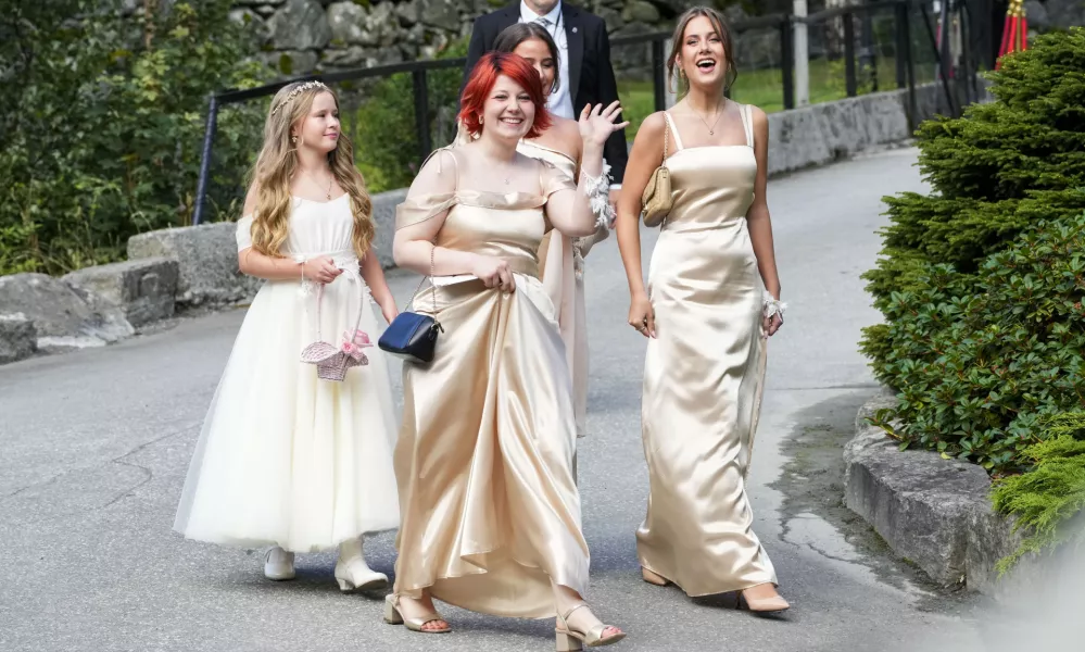 The daughters of Norway's Princess Martha Louise, Maud Angelica Behn, Emma Tallulah Behn and Leah Isadora Behn, in Geiranger, Norway, Saturday Aug. 31, 2024, during the wedding of Princess Martha Louise and Durek Verrett. (Cornelius Poppe/NTB via AP)