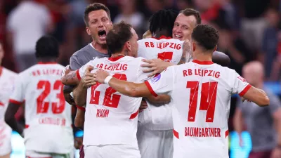 Soccer Football - Bundesliga - Bayer Leverkusen v RB Leipzig - BayArena, Leverkusen, Germany - August 31, 2024 RB Leipzig players celebrate after the match REUTERS/Thilo Schmuelgen DFL REGULATIONS PROHIBIT ANY USE OF PHOTOGRAPHS AS IMAGE SEQUENCES AND/OR QUASI-VIDEO.