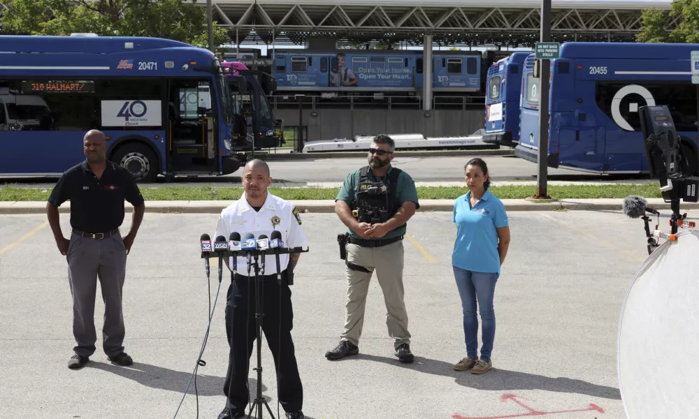 Forest Park police Deputy Chief Christopher Chin gives a news briefing outside the CTA Forest Park station, after a shooting, Monday, Sept. 2, 2024, in Forest Park, Ill. (John J. Kim/Chicago Tribune via AP)