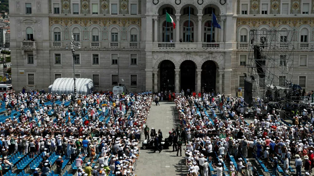 Pope Francis leaves after attending a mass at Piazza Unita d'Italia in Trieste, Italy, July 7, 2024. REUTERS/Alessandro Garofalo