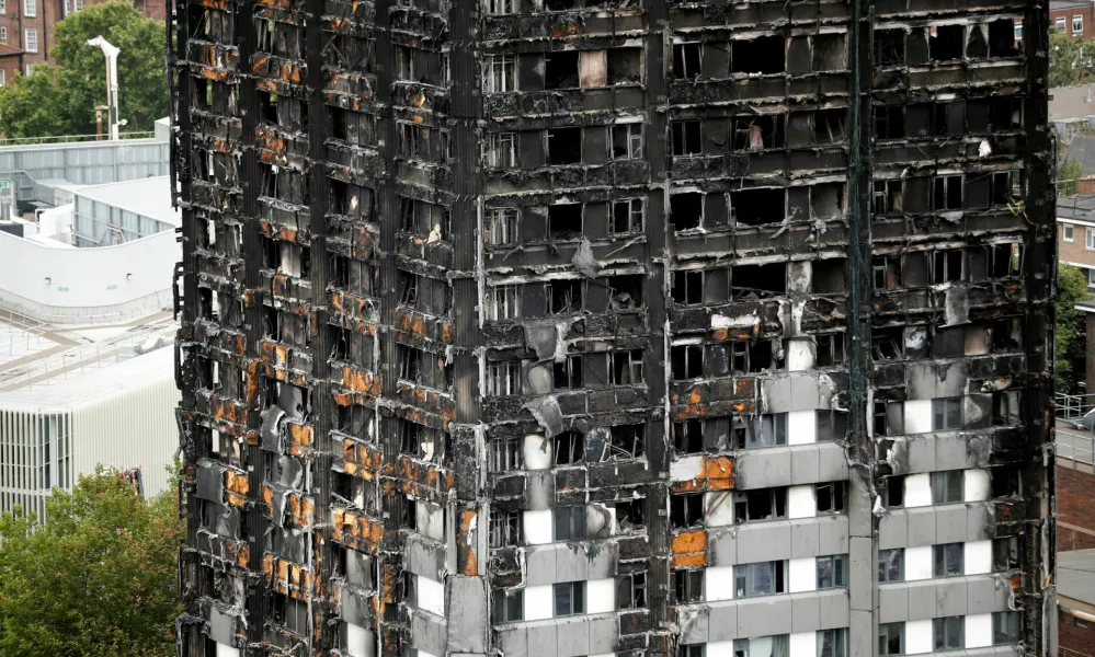 FILE PHOTO: A general view shows the Grenfell Tower, which was destroyed in a fatal fire, in London, Britain July 15, 2017. REUTERS/Tolga Akmen/File Photo