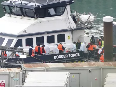 A group of people thought to be migrants are brought in to Dover, Kent, from a Border Force vessel following a small boat incident in the Channel, Wednesday Sept. 4, 2024. (Gareth Fuller/PA via AP)