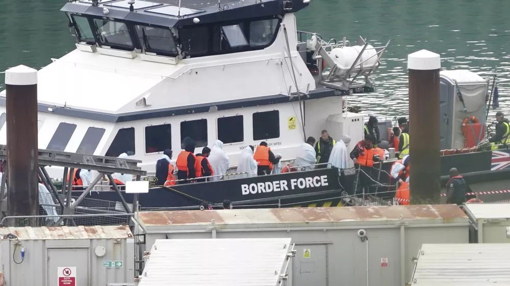 A group of people thought to be migrants are brought in to Dover, Kent, from a Border Force vessel following a small boat incident in the Channel, Wednesday Sept. 4, 2024. (Gareth Fuller/PA via AP)