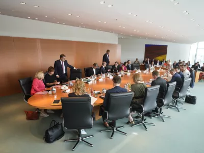 The German government with German Chancellor Olaf Scholz, center background, meets for the weekly cabinet meeting at the chancellery in Berlin, Germany, Wednesday, Sept. 4, 2024. (AP Photo/Markus Schreiber)