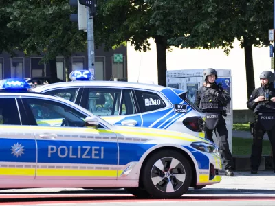 Police officer block a street after police fired shots at a suspicious person near the Israeli Consulate and a museum on the city's Nazi-era history in Munich, Germany, Thursday, Sept. 5, 2024. (AP Photo/Matthias Schrader)