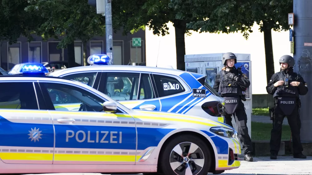 Police officer block a street after police fired shots at a suspicious person near the Israeli Consulate and a museum on the city's Nazi-era history in Munich, Germany, Thursday, Sept. 5, 2024. (AP Photo/Matthias Schrader)