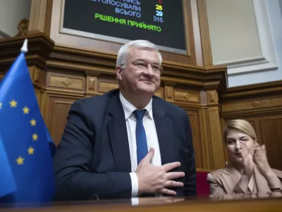 In this photo provided by the Ukrainian Parliament Press Office, Ukraine's newly appointed Foreign Minister Andrii Sybiha speaks in parliament in Kyiv, Ukraine, Thursday, Sept. 5, 2024. (Andrii Nesterewnko/Ukrainian Parliament Press Office via AP)