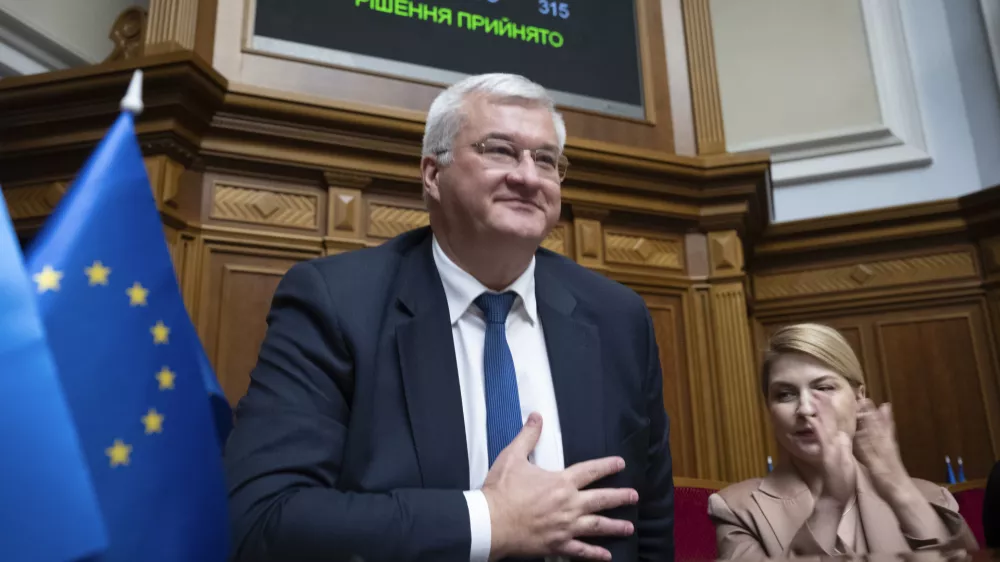 In this photo provided by the Ukrainian Parliament Press Office, Ukraine's newly appointed Foreign Minister Andrii Sybiha speaks in parliament in Kyiv, Ukraine, Thursday, Sept. 5, 2024. (Andrii Nesterewnko/Ukrainian Parliament Press Office via AP)