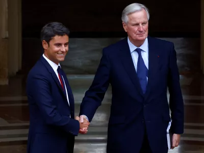 Outgoing France's Prime Minister Gabriel Attal and newly appointed Prime Minister Michel Barnier arrive for the handover ceremony at the Hotel Matignon in Paris, France, September 5, 2024. REUTERS/Sarah Meyssonnier/Pool