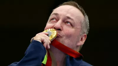 Paris 2024 Paralympics - Shooting - R4 - Mixed 10m Air Rifle Standing SH2 Final - Chateauroux Shooting Centre, Deols, France - August 30, 2024 Gold medallist Francek Gorazd Tirsek of Slovenia celebrates after the final REUTERS/Eng Chin An