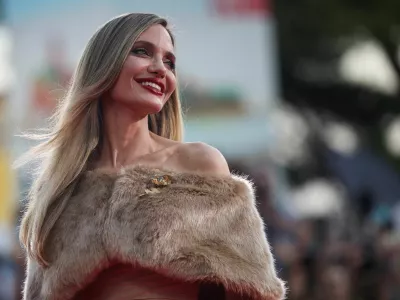 FILE PHOTO: Actor Angelina Jolie poses on the red carpet during arrivals for the screening of the movie "Maria", in competition, at the 81st Venice Film Festival, Venice, Italy, August 29, 2024. REUTERS/Louisa Gouliamaki/File Photo