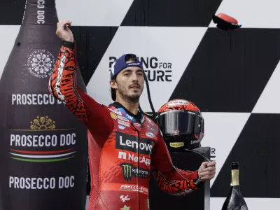 MotoGP - Austrian Grand Prix - Red Bull Ring, Spielberg, Austria - August 18, 2024 Ducati Lenovo Team's Francesco Bagnaia celebrates on the podium after winning the MotoGP REUTERS/Leonhard Foeger