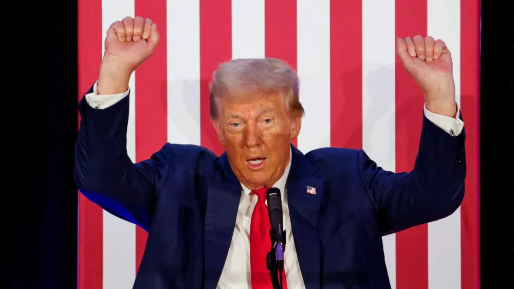 Republican presidential nominee and former U.S. President Donald Trump gestures as he addresses the Fraternal Order of Police at their meeting in Charlotte, North Carolina, U.S. September 6, 2024. REUTERS/Jonathan Drake   TPX IMAGES OF THE DAY