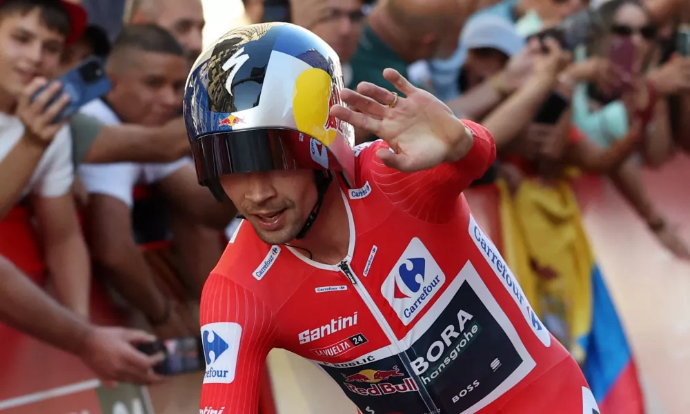 Cycling - Vuelta a Espana - Stage 21 - Madrid to Madrid - Spain - September 8, 2024 Red Bull - Bora - Hansgrohe's Primoz Roglic celebrates after winning the Vuelta a Espana REUTERS/Isabel Infantes