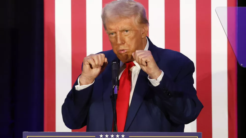 Republican presidential nominee former President Donald Trump gestures as he speaks to the Fraternal Order of Police in Charlotte, N.C., Friday, Sept. 6, 2024. (AP Photo/Nell Redmond)