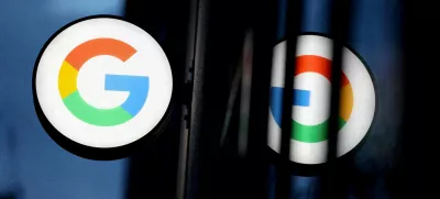 FILE PHOTO: The logo for Google is seen at the Google Store Chelsea in Manhattan, New York City, U.S., November 17, 2021. REUTERS/Andrew Kelly/File Photo