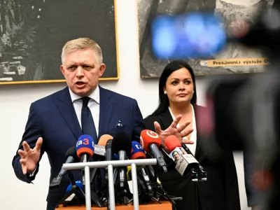 FILE PHOTO: Slovakia's Prime Minister Robert Fico speaks during his visit of Handlova, the town where a gunman shot him in May in an attempted assassination, as Mayor of Handlova Silvia Gruberova listens, in Handlova, Slovakia, September 6, 2024. REUTERS/Radovan Stoklasa/File Photo