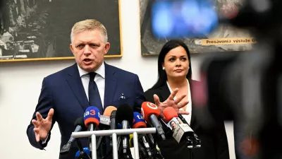 FILE PHOTO: Slovakia's Prime Minister Robert Fico speaks during his visit of Handlova, the town where a gunman shot him in May in an attempted assassination, as Mayor of Handlova Silvia Gruberova listens, in Handlova, Slovakia, September 6, 2024. REUTERS/Radovan Stoklasa/File Photo