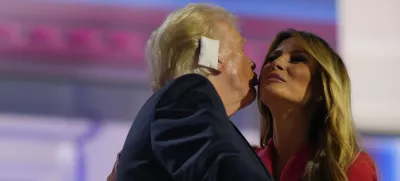 Republican presidential candidate former President Donald Trump, greets his wife, Melania Trump on stage during the Republican National Convention, Thursday, July 18, 2024, in Milwaukee. (AP Photo/Julia Nikhinson)