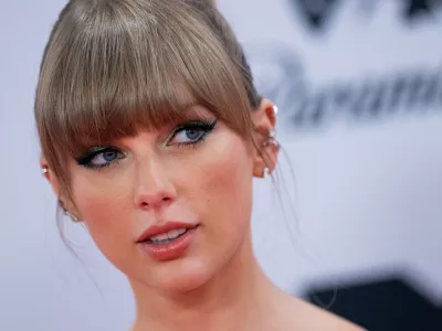 FILED - 13 November 2022, North Rhine-Westphalia, Duesseldorf: American singer Taylor Swift walks the red carpet at the MTV Europe Music Awards in front of the PSD Bank Dome. Swift has endorsed Democratic presidential candidate Kamala Harris in the upcoming US elections. Photo: Rolf Vennenbernd/dpa