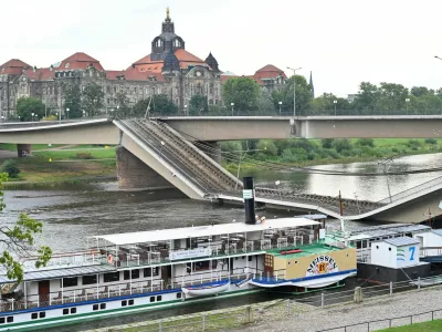 View of the broken part of the Carola Bridge (Carolabruecke) which collapsed into the Elbe, in Dresden, Germany September 11, 2024. REUTERS/Matthias Rietschel